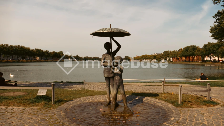 Lakeside Sculpture Under Umbrella