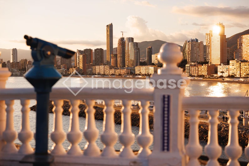 Sunlit Cityscape by the Sea