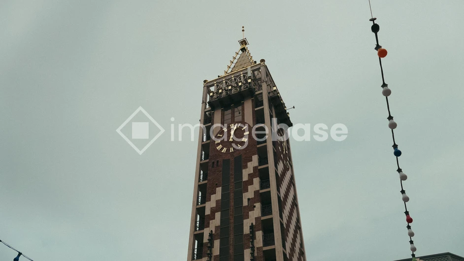 Clock Tower Against Cloudy Sky