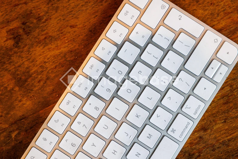Modern Keyboard on Wooden Surface