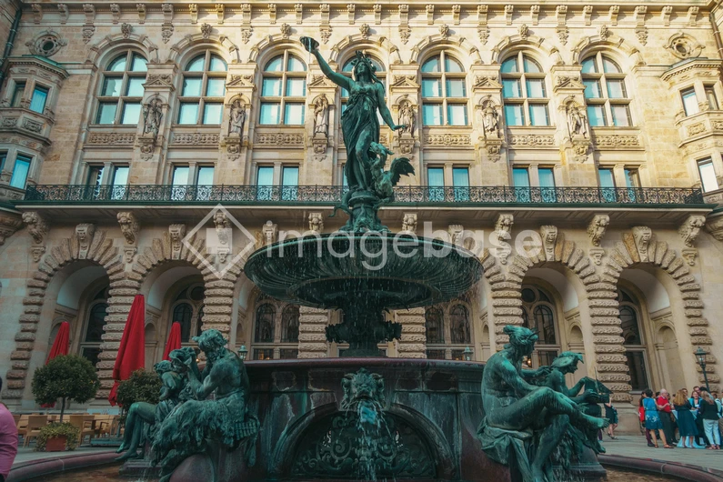 Historic Fountain in Front of Ornate Building