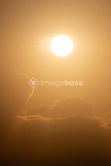 Golden Sun Behind Clouds