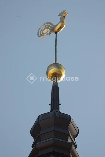 Golden Weather Vane on a Steeple