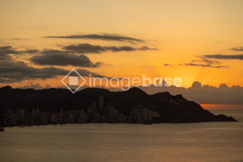 Sunset over Coastal Cityscape