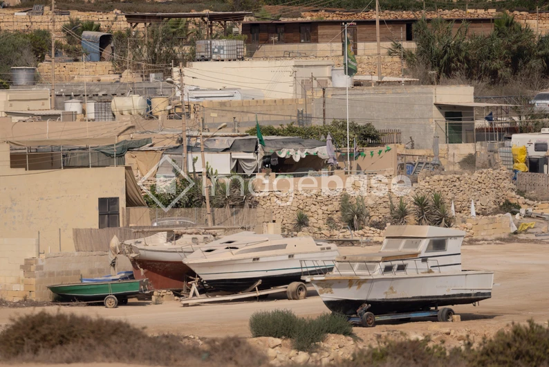 Rustic Coastal Village with Boats
