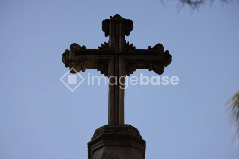Silhouette of a Stone Cross