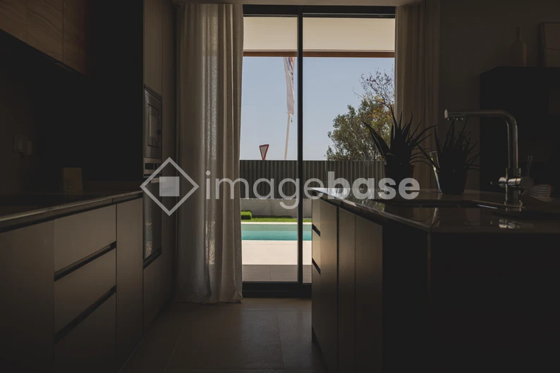 Modern Kitchen Overlooking Pool