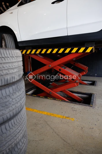 Car on Garage Lift