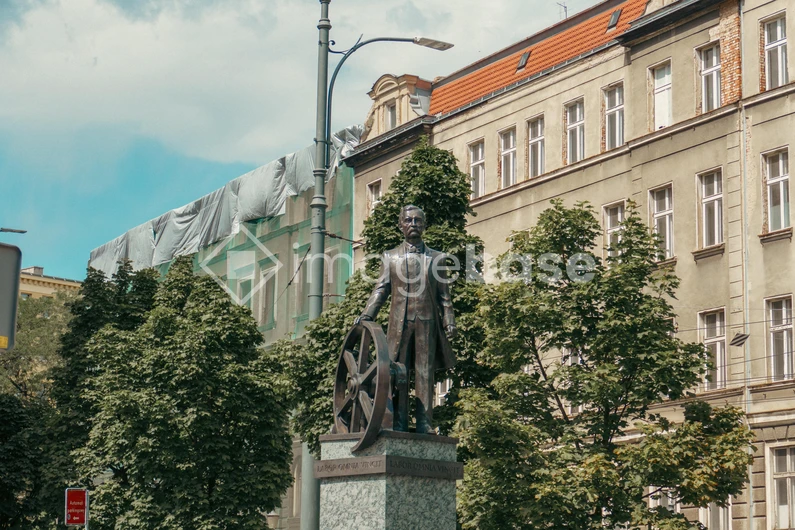 Urban Statue with Historical Architecture