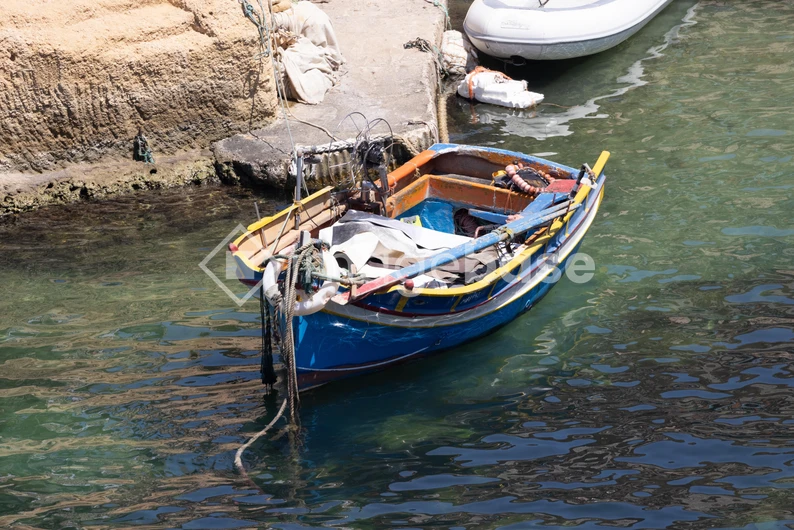 Colorful Boat Docked by the Sea