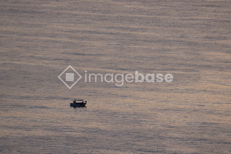 Solitary Boat on Calm Waters
