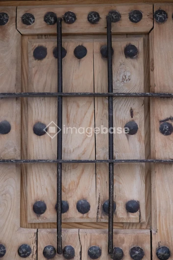 Wooden Door with Iron Bars