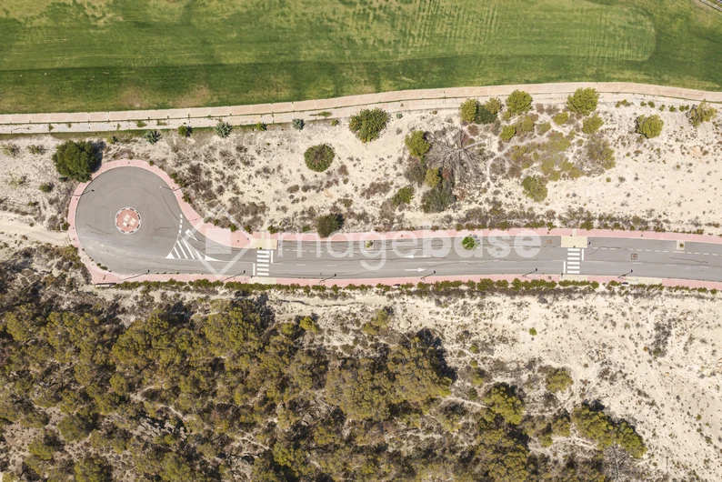 Aerial View of Desert Landscape and Roadway