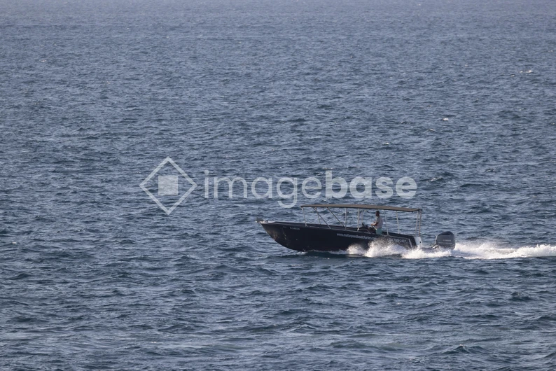 Boat on the Open Sea