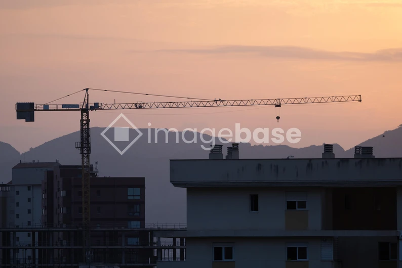 Sunset Over Urban Construction