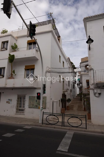 White Stucco Buildings on Cozy Street