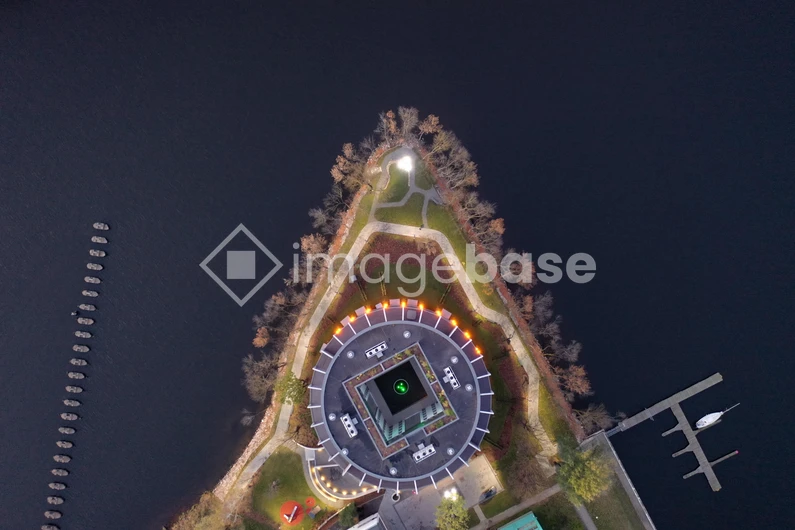 Aerial View of a Modern Building on Water