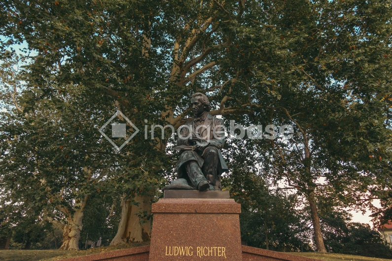 Statue Under the Trees