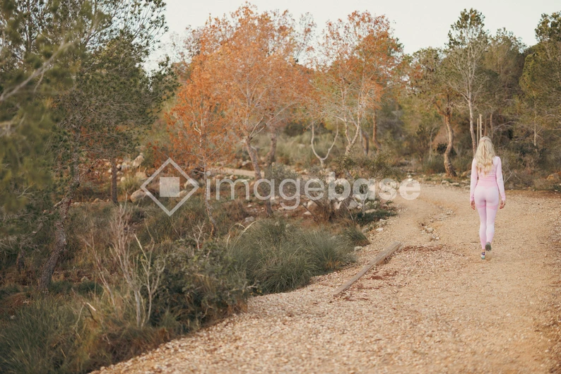 Woman Walking in Nature
