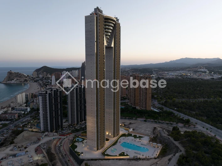 Sunset Cityscape with Tower