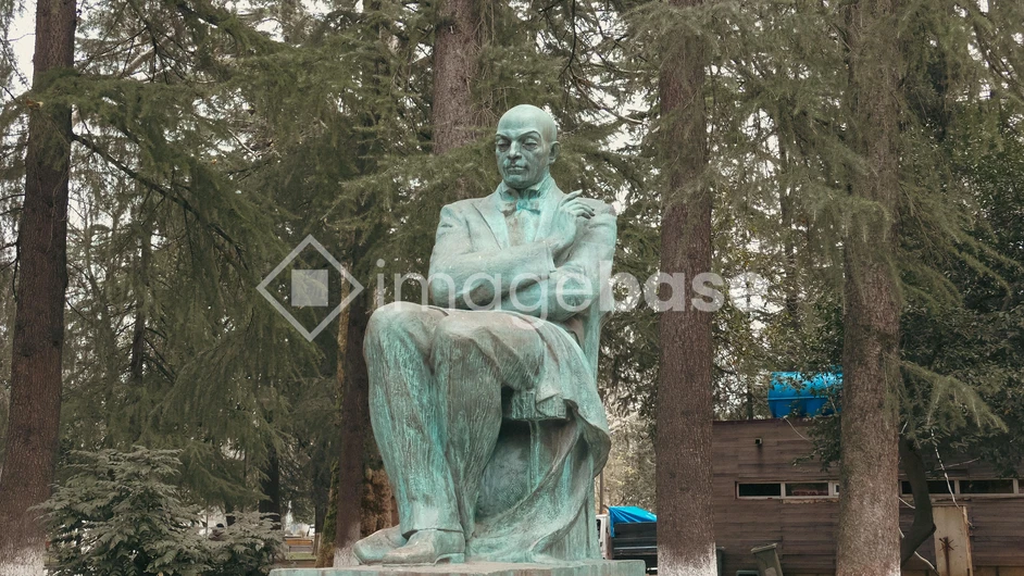 Statue in a Forested Area
