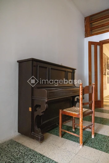 Antique Piano in Hallway