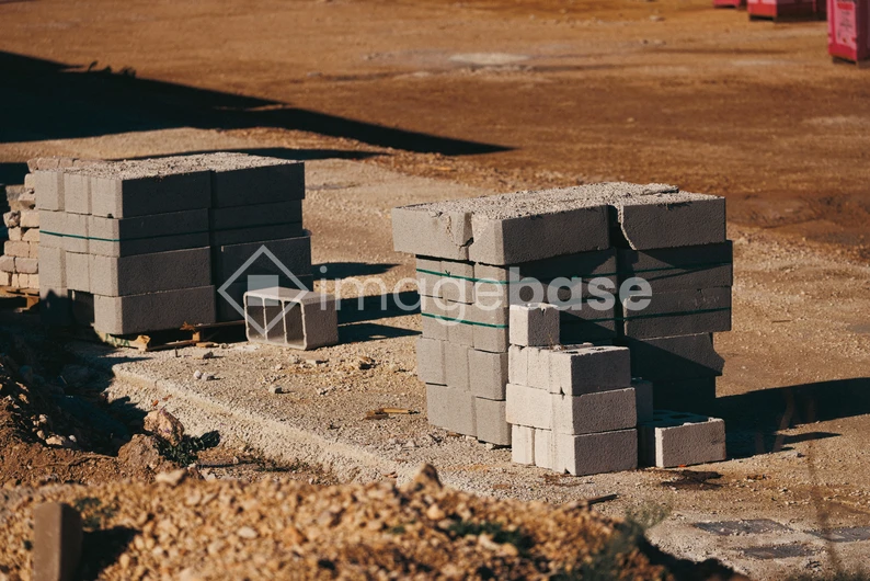 Construction Site with Stacked Concrete Blocks