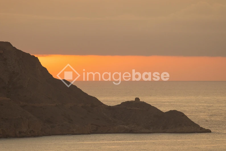 Sunset Over Coastal Cliffs