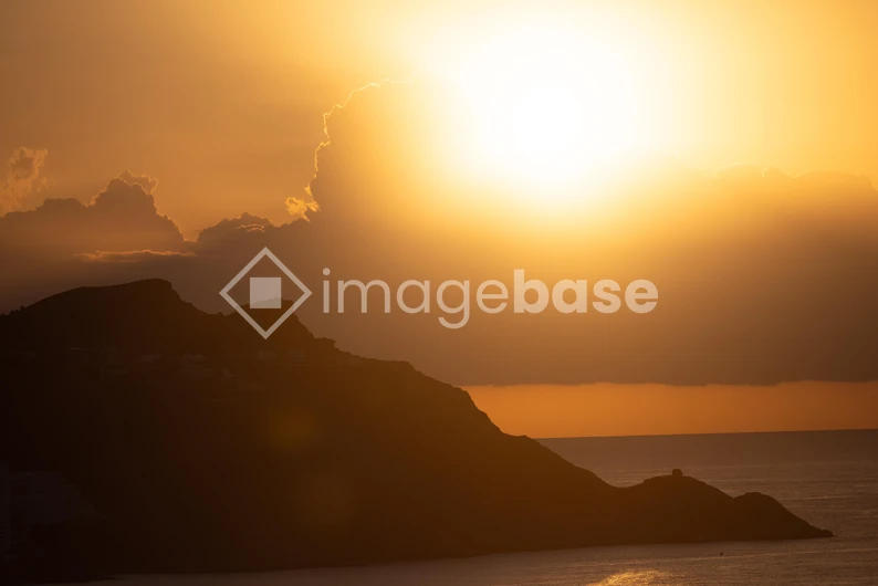 Golden Sunset Over Hills