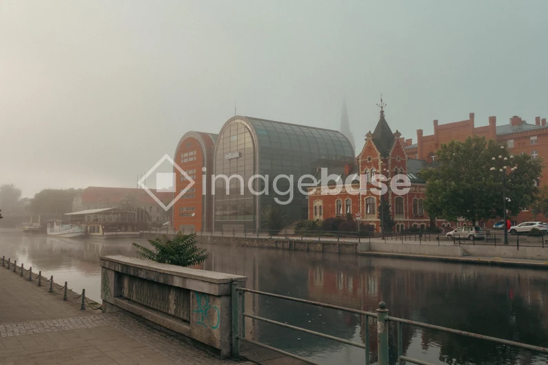 Misty Riverbank Architecture