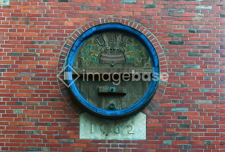 Rustic Barrel Decoration on Brick Wall