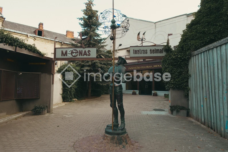 Quaint Courtyard with Sculpture