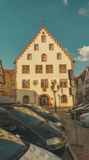 Historic Building with Parked Cars