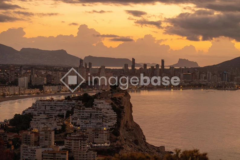 Sunset Over Coastal Cityscape