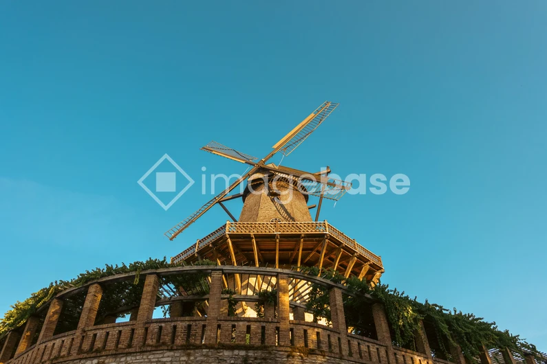 Historic Windmill Under Blue Sky