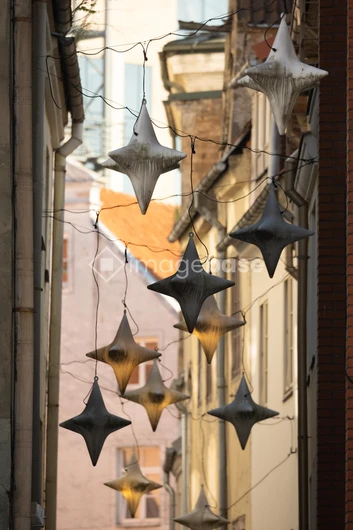 Hanging Star Decorations in Alley